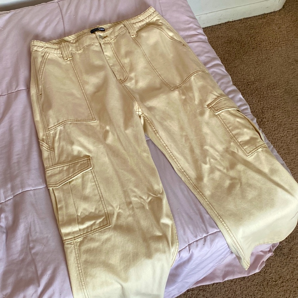 cream cargos, never worn, great condition